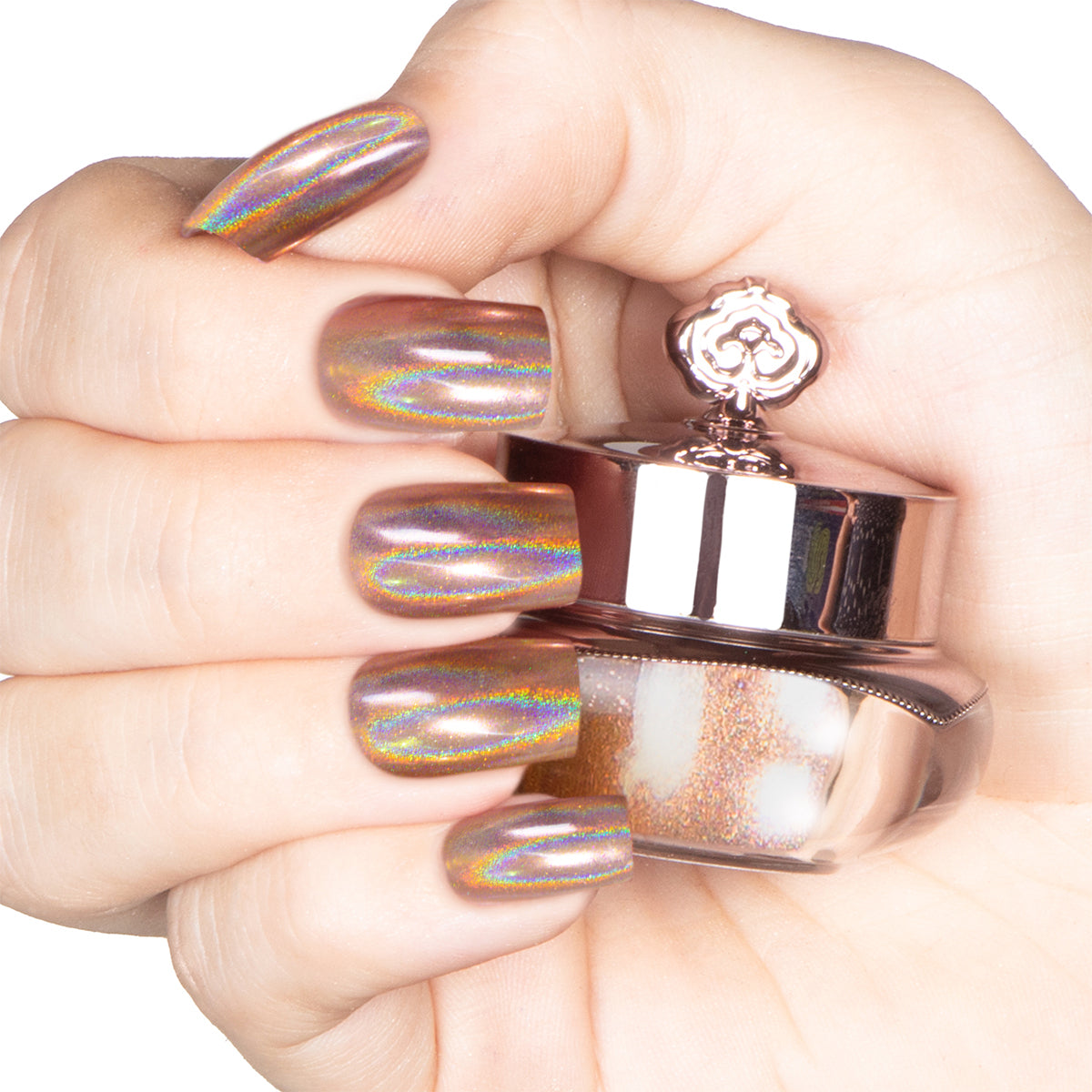 Nails featuring a rose-gold copper base holographic powder with a radiant, shimmery finish.